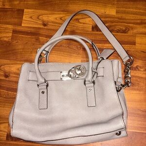 Micheal Kors gray shoulder bag with key clip